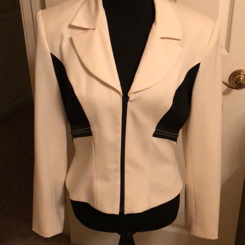 Designer form fitted jacket. Cream and black